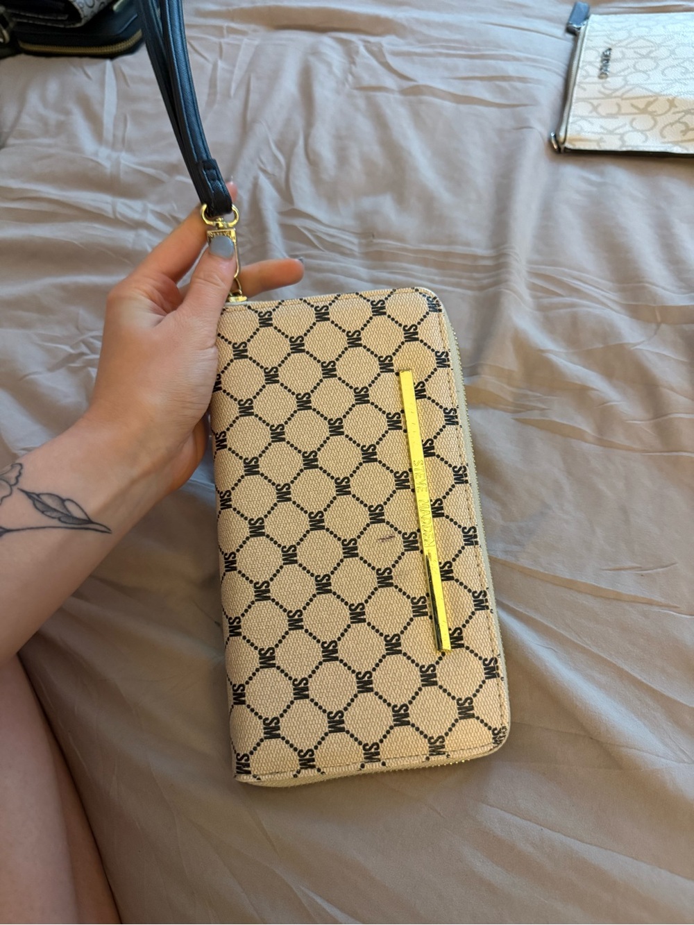 Steve Madden Cream Wristlet Wallet with Black Pattern and Gold Accent